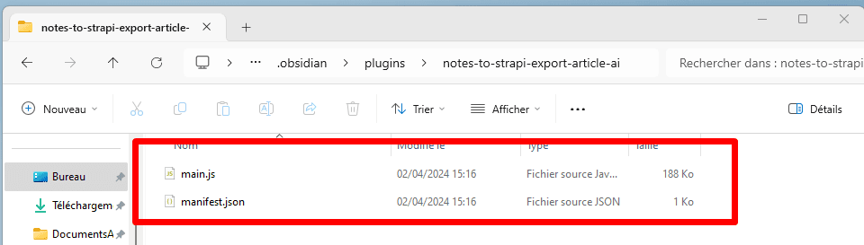 Computer screen displaying a file explorer window with highlighted files 'main.js' (188 KB) and 'manifest.json' (1 KB)